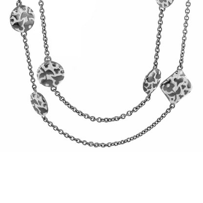 Flowers by Orly long silver necklace with camo-patterned round and square charms on Tampa Home & Garden Store