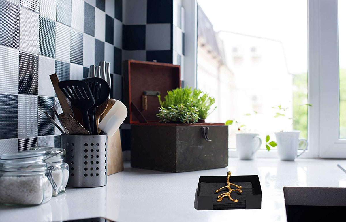 Vibhsa napkin holder dining decor gold olive bud embellishment in a black tray on Tampa Home & Garden Store