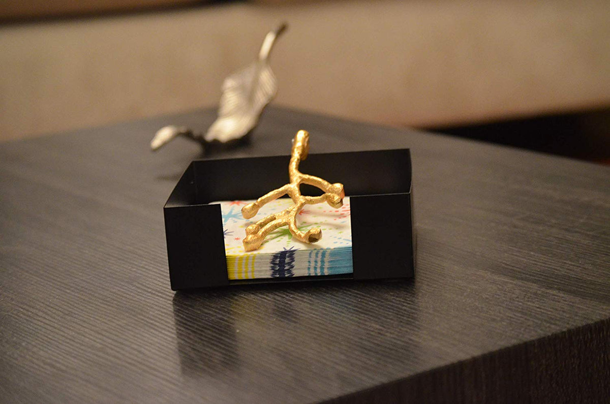 Vibhsa Napkin Holder Dining Decor black holder with gold olive-branch accent on colorful napkins on Tampa Home & Garden Store