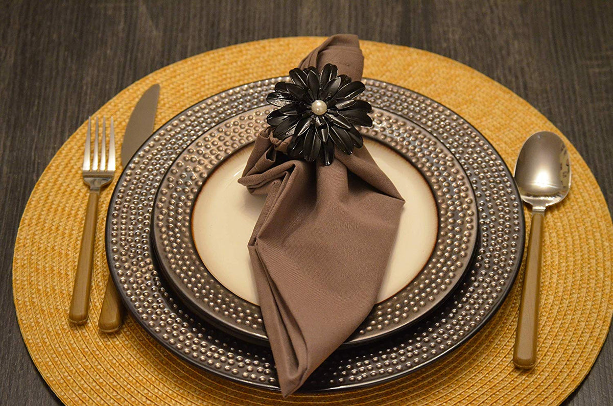 Vibhsa Black Floral Napkin Rings set of 4 with pearl centers on brown napkin on Tampa Home & Garden Store