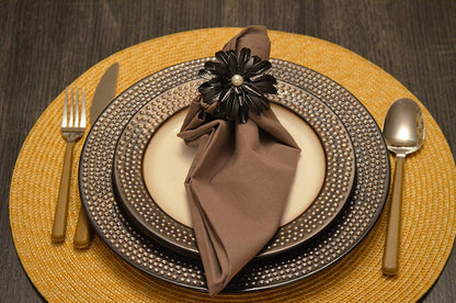 Vibhsa Black Floral Napkin Rings set of 4 with pearl centers on brown napkin on Tampa Home & Garden Store