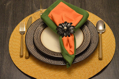 Vibhsa black floral napkin rings set of 4 with pearl, securing orange napkin on green on Tampa Home & Garden Store