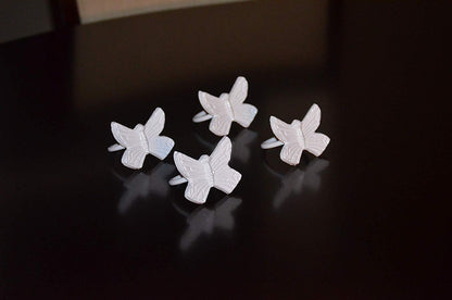 Vibhsa white butterfly napkin rings aluminum handcrafted set of 4 on Tampa Home & Garden Store