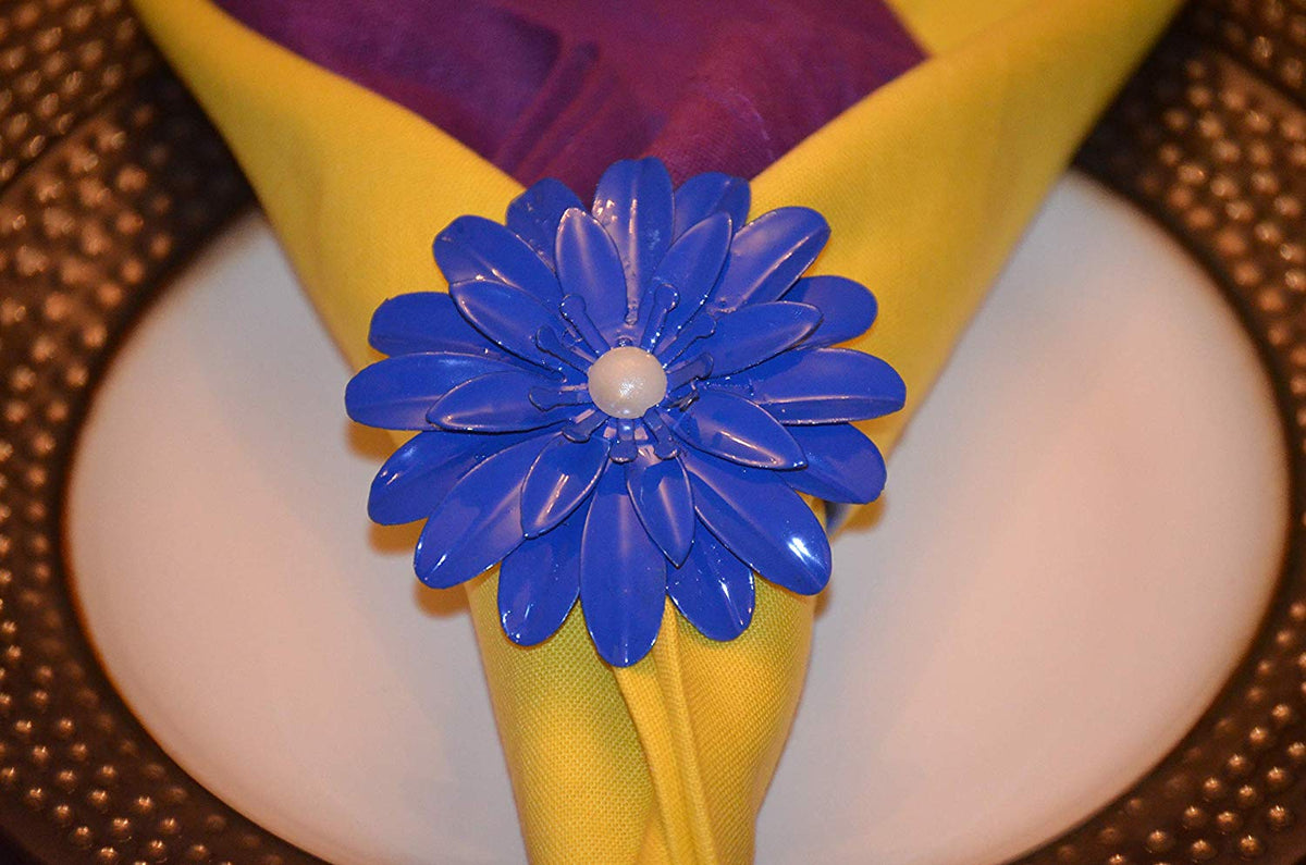 Vibhsa blue floral napkin ring with pearl center on yellow napkin on Tampa Home & Garden Store