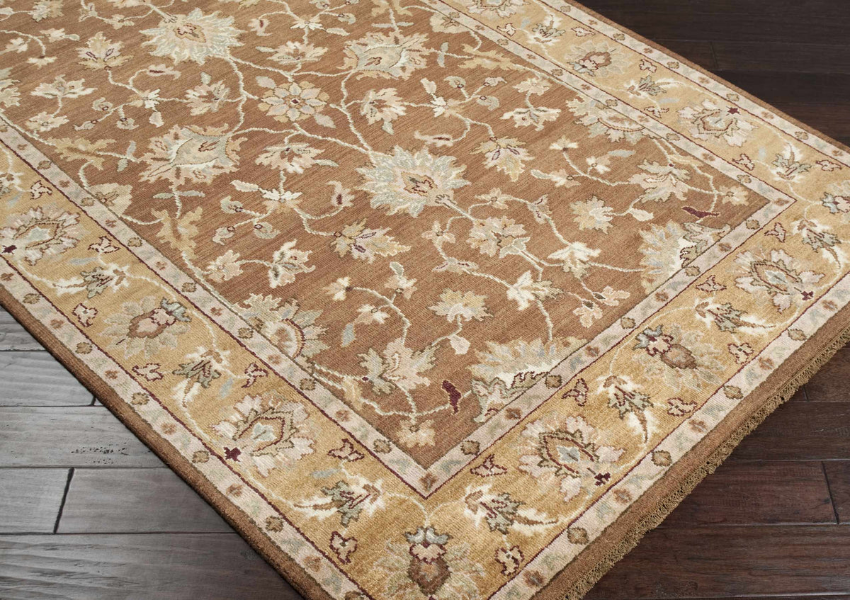 Napolville Premium Wool Area Rug brown field with ivory floral border on dark wood floor on Tampa Home & Garden Store