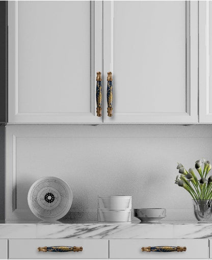 Stevvex navy blue ceramic door handles with gold accents for cabinet doors and drawer pulls on Tampa Home & Garden Store