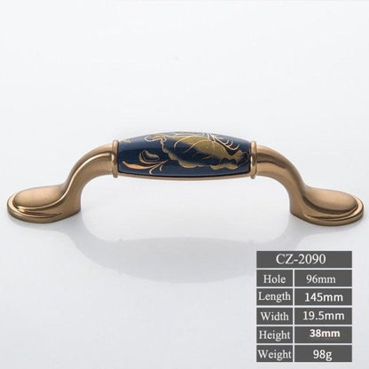 Stevvex navy blue ceramic door handle with antique bronze ends and floral motif for double doors on Tampa Home & Garden Store