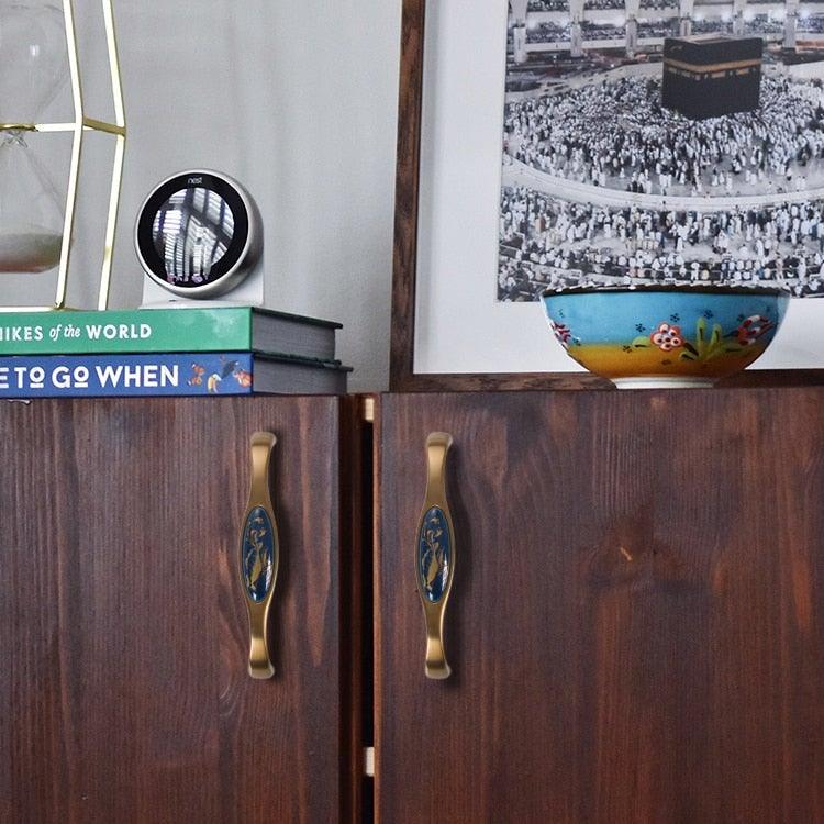 Door handles by Stevvex: brass pulls with navy blue ceramic inlays on dark wood, 2-pcs on Tampa Home & Garden Store