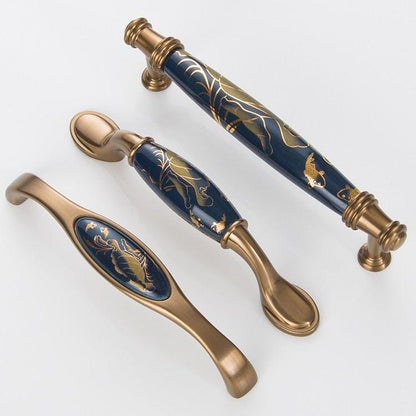 Stevvex navy ceramic door handles with brass ends and gold floral pattern for right left doors on Tampa Home & Garden Store