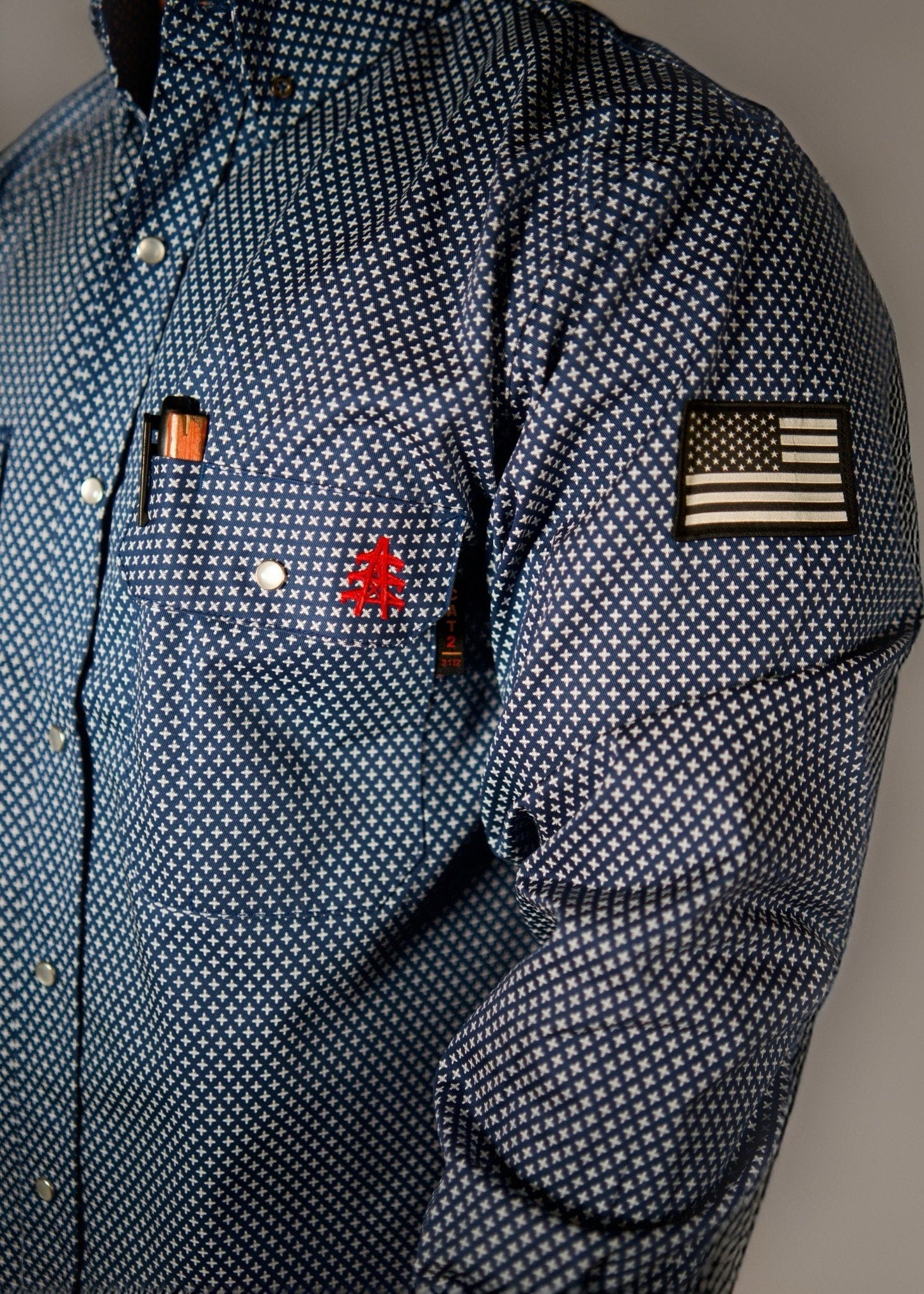 Static FR Pearl Snap Work Shirt Honor Navy with U.S. flag patch on sleeve, white cross pattern, pearl snaps on Tampa Home & Garden Store