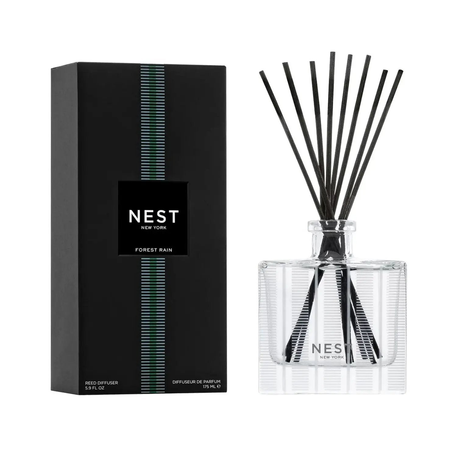 Nest New York Forest Rain Reed Diffuser 175 mL with black reeds in clear square bottle on Tampa Home & Garden Store