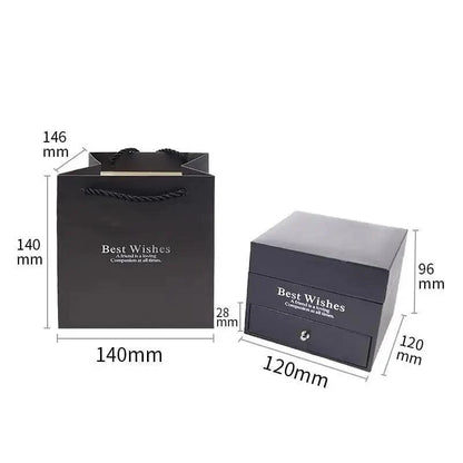 Black gift bag with rope handles and dark blue jewelry box with Best Wishes engraving on Tampa Home & Garden Store