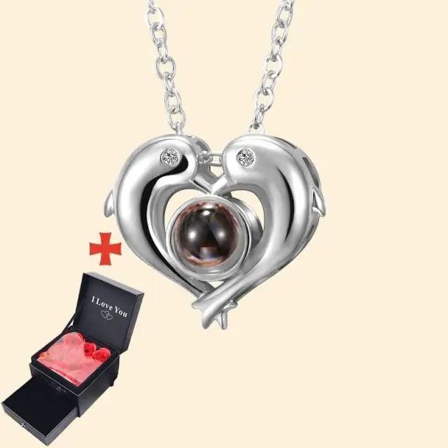 Stevvex double-swan heart pendant necklace with central orb and crystal accents on Tampa Home & Garden Store