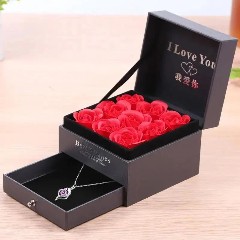 Stevvex gift box with lid open; red roses top, purple heart pendant necklace inside Tampa Store on Tampa Home & Garden Store