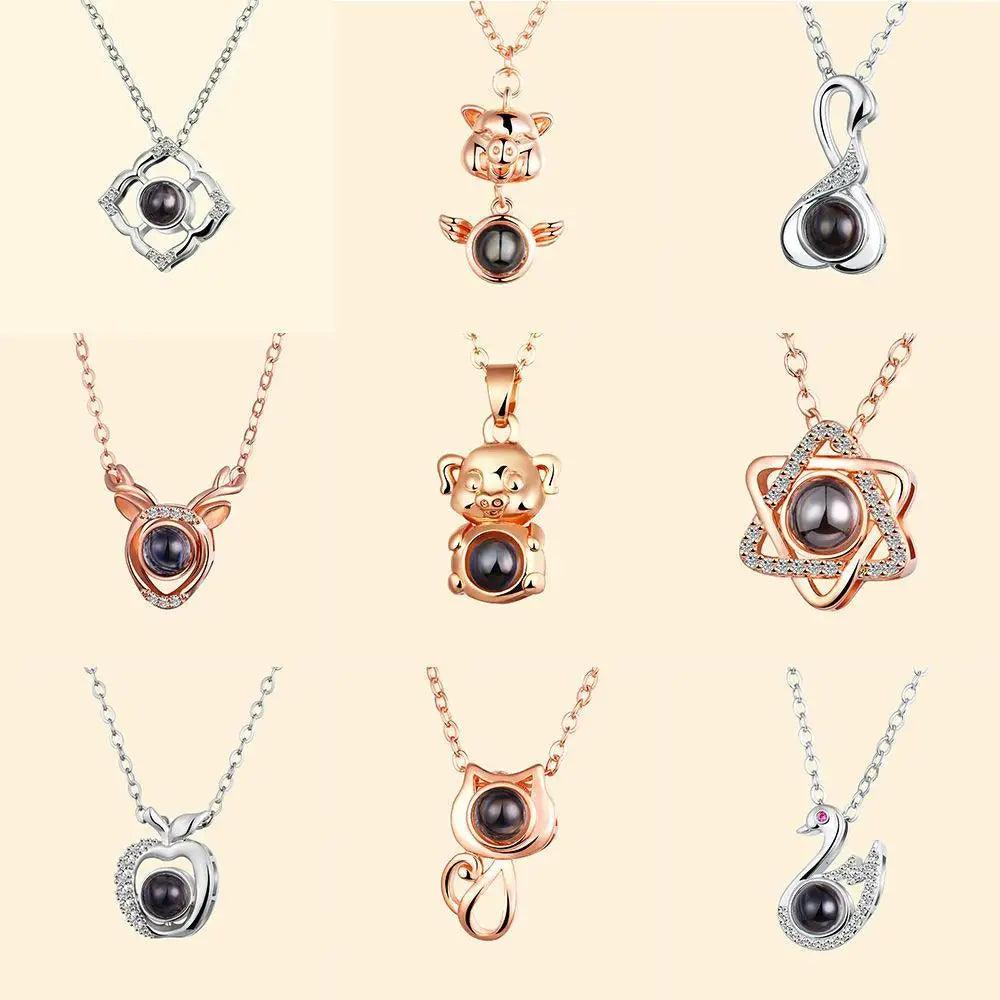 ALU93241RSS nine pendant necklaces with black pearl centers in rose-gold and silver tones on Tampa Home & Garden Store