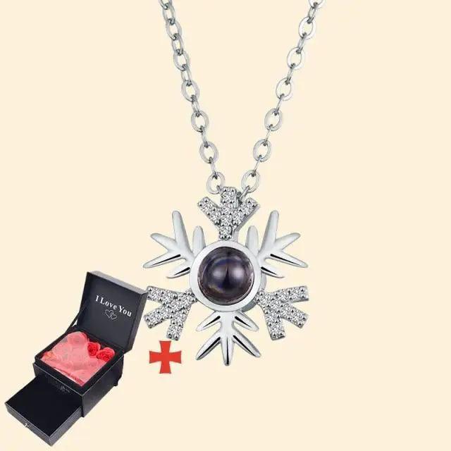 Necklace with crystal starburst pendant and dark pearl center; 1 gift box with red hearts on Tampa Home & Garden Store