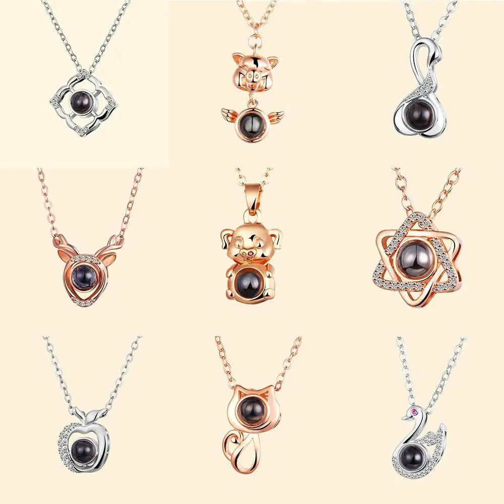 Stevvex nine pendant necklaces with black pearls in silver and rose-gold tones, various shapes on Tampa Home & Garden Store