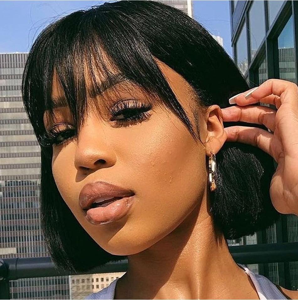 Wig: short straight black bob with bangs on a model, glossy finish on Tampa Home & Garden Store