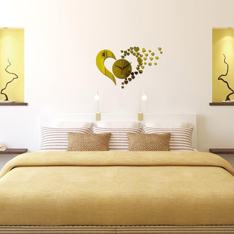 Stevvex 3D frameless acrylic wall clock with gold heart art design above bed on Tampa Home & Garden Store