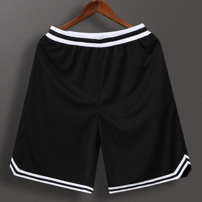 Stevvex men's black basketball shorts with white elastic waistband and white striped hem on Tampa Home & Garden Store