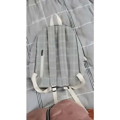Striped plaid school backpack by Stevvex with white straps and front zip pocket grey tones on Tampa Home & Garden Store