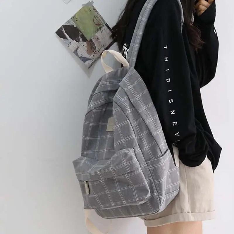 Grey plaid school backpack by Stevvex with front pocket and top carry handle on Tampa Home & Garden Store