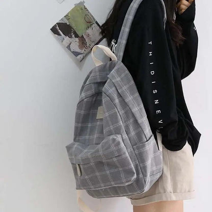 Grey plaid school backpack by Stevvex with front pocket and top carry handle on Tampa Home & Garden Store