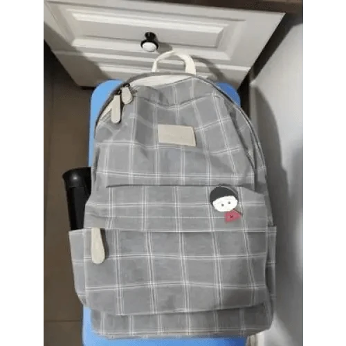 Stevvex gray plaid school backpack with front zip pocket, top handle, cartoon patch for teens on Tampa Home & Garden Store
