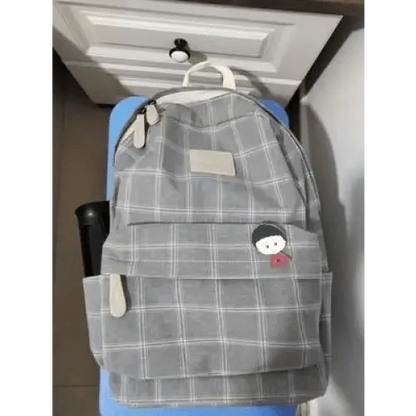 Stevvex gray plaid school backpack with front zip pocket, top handle, cartoon patch for teens on Tampa Home & Garden Store