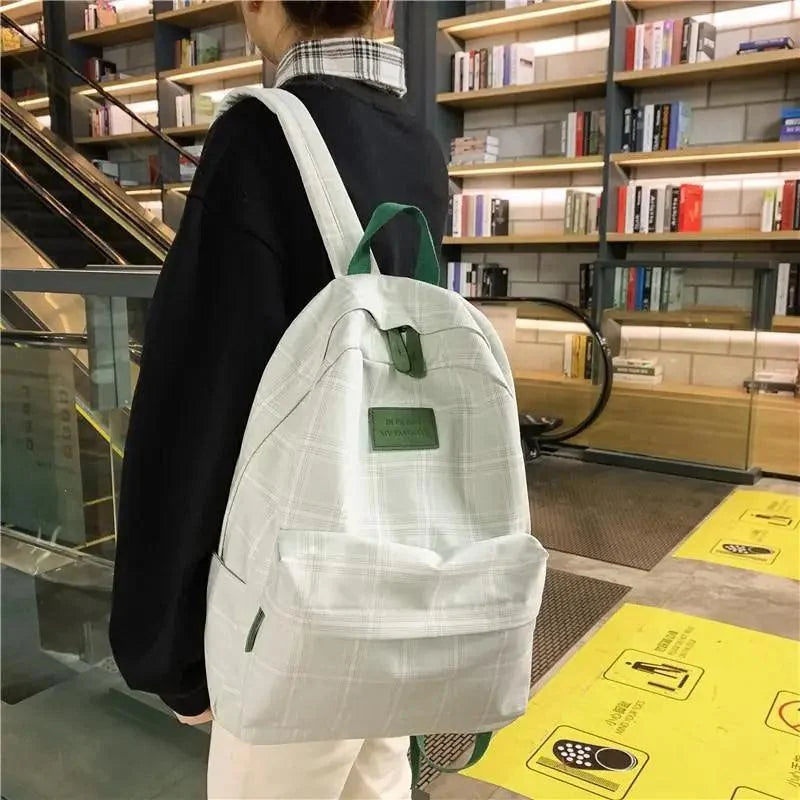 Stevvex casual school backpack for women, white plaid striped book bag with green accent patch on Tampa Home & Garden Store