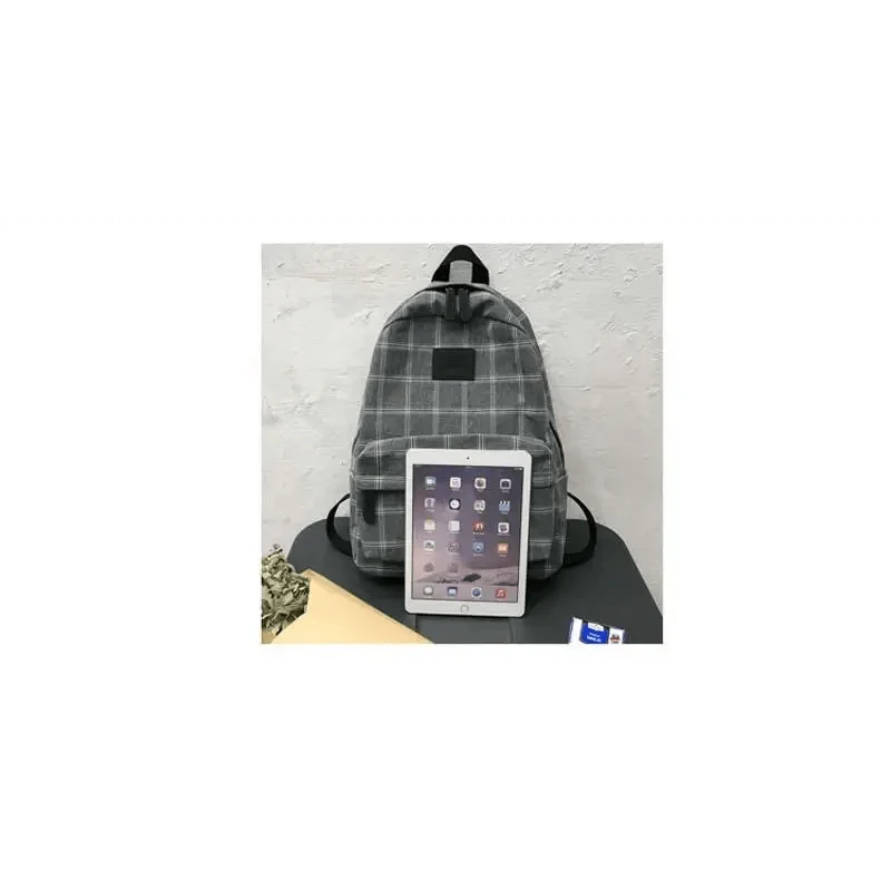 Stevvex gray plaid school backpack for teens with front pocket and black straps on Tampa Home & Garden Store