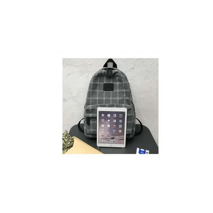 Stevvex gray plaid school backpack for teens with front pocket and black straps on Tampa Home & Garden Store