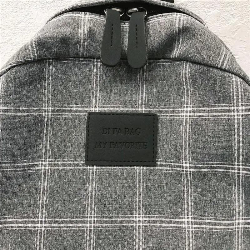 Stevvex plaid school backpack with dual zippers and black patch label on Tampa Home & Garden Store