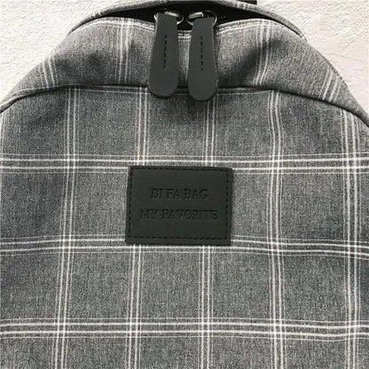 Stevvex plaid school backpack with dual zippers and black patch label on Tampa Home & Garden Store