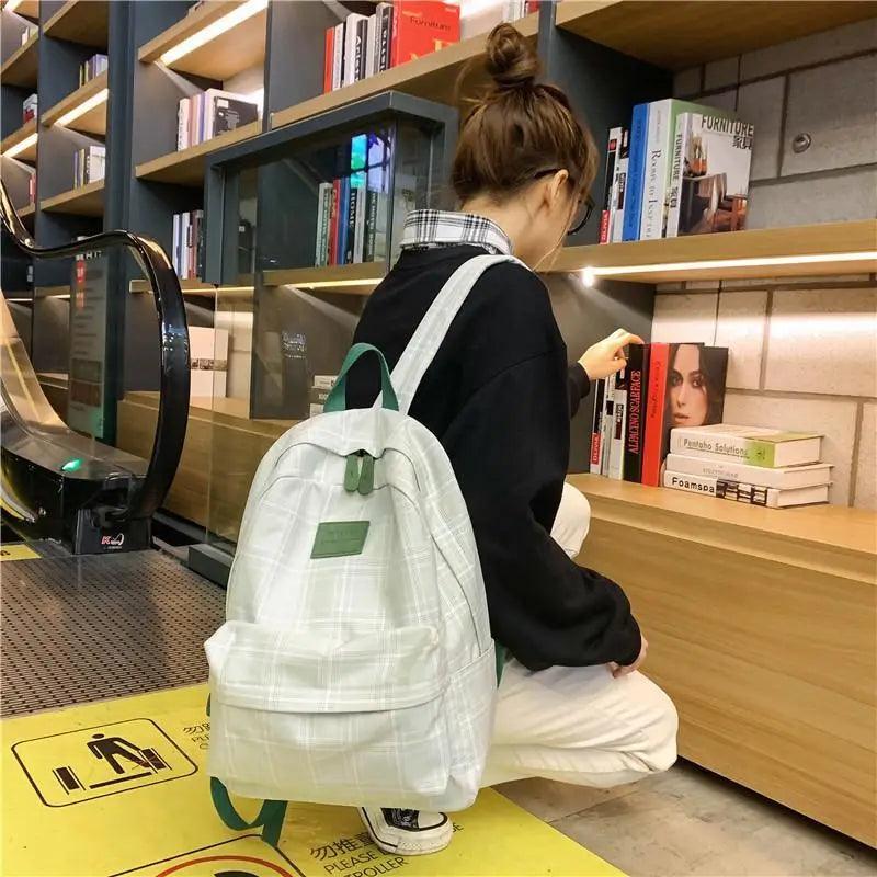Stevvex striped plaid school backpack for women, light gray with green accents in a bookstore on Tampa Home & Garden Store