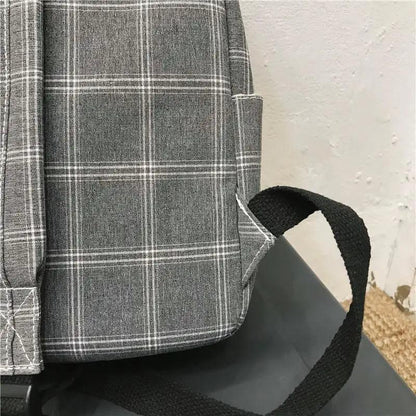 Stevvex gray plaid school backpack with black woven strap for teens on Tampa Home & Garden Store