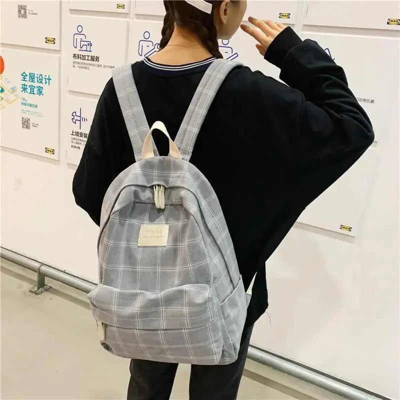 School backpack Stevvex gray plaid with top handle and front pocket on Tampa Home & Garden Store