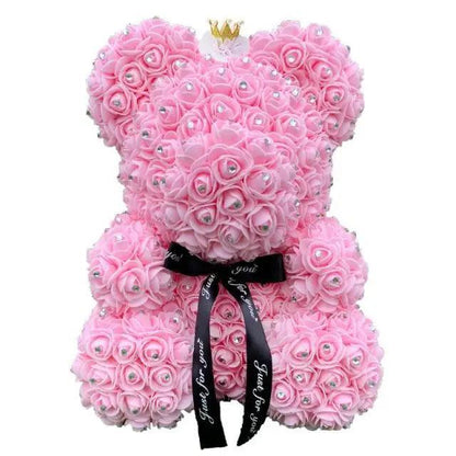 Pink rose teddy bear made of artificial blossoms with rhinestone centers crown and black ribbon on Tampa Home & Garden Store