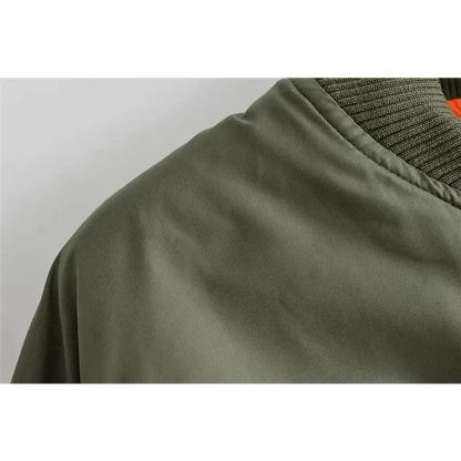 Green Stevvex bomber jacket close-up fabric texture with ribbed collar on Tampa Home & Garden Store