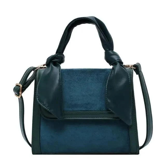 Stevvex shoulder bag with blue panel and dark leather trim, knot handles, gold hardware on Tampa Home & Garden Store