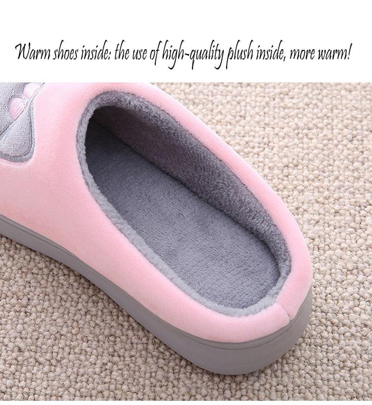 Pink fuzzy slip-on women's slippers with grey plush lining and memory foam interior on Tampa Home & Garden Store