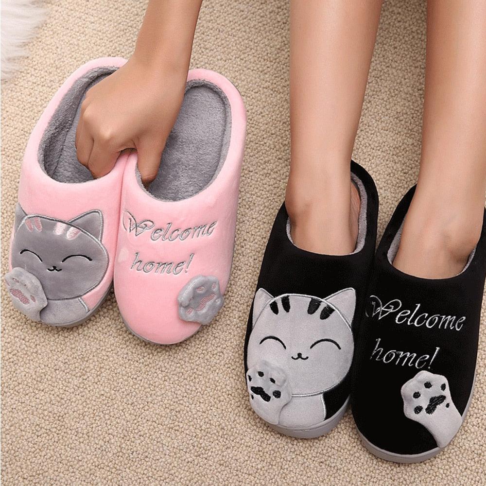 Stevvex cat slippers, pink and black plush memory-foam slip-ons with cat face paw prints on Tampa Home & Garden Store