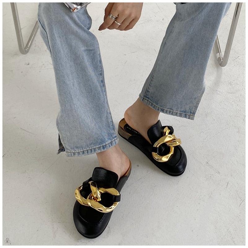Stevvex women's black mule sandals with chunky gold chain ornament and flat sole on Tampa Home & Garden Store