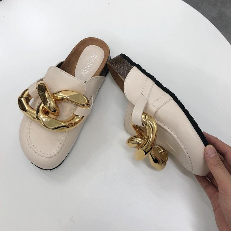Stevvex beige slip-on sandals with bold gold chain, round toe, low heel pair on Tampa Home & Garden Store