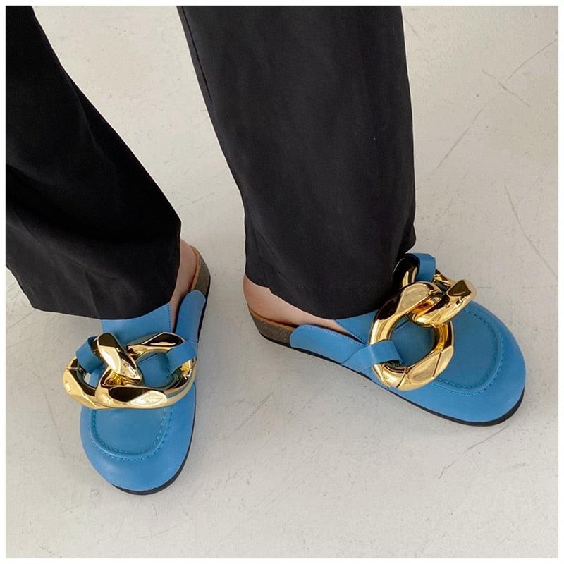Sandals Stevvex in blue with chunky gold chain embellishment and closed-toe design on Tampa Home & Garden Store