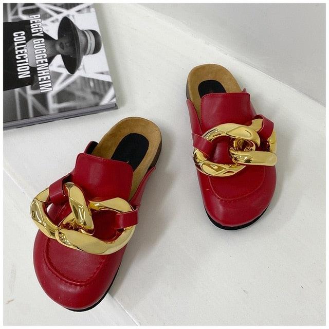 Red Stevvex slip-on mule sandals with bold gold chain embellishment, closed toe on Tampa Home & Garden Store