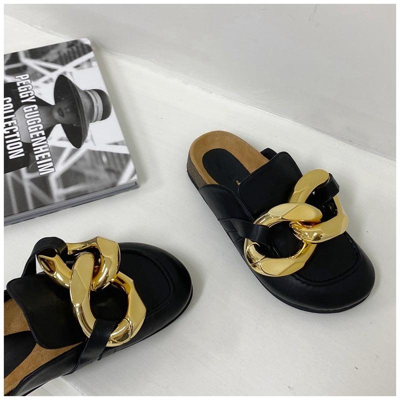 Stevvex black sandals with chunky gold chain strap, closed-toe slip-on mule pair shown on Tampa Home & Garden Store