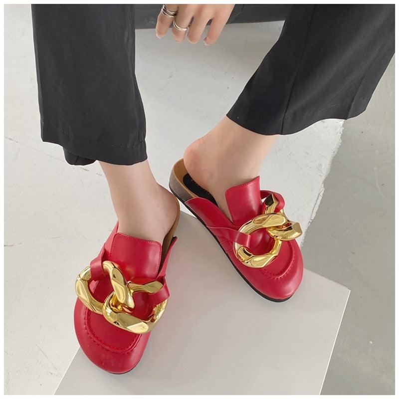 Red chain-embellished slip-on mule sandals with a bold gold chain, round toe, flat sole on Tampa Home & Garden Store