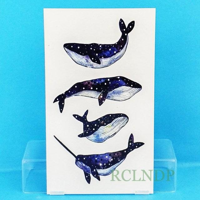 Stevvex temporary tattoo sheet with 4 galaxy whale designs in blue hues on white card on Tampa Home & Garden Store