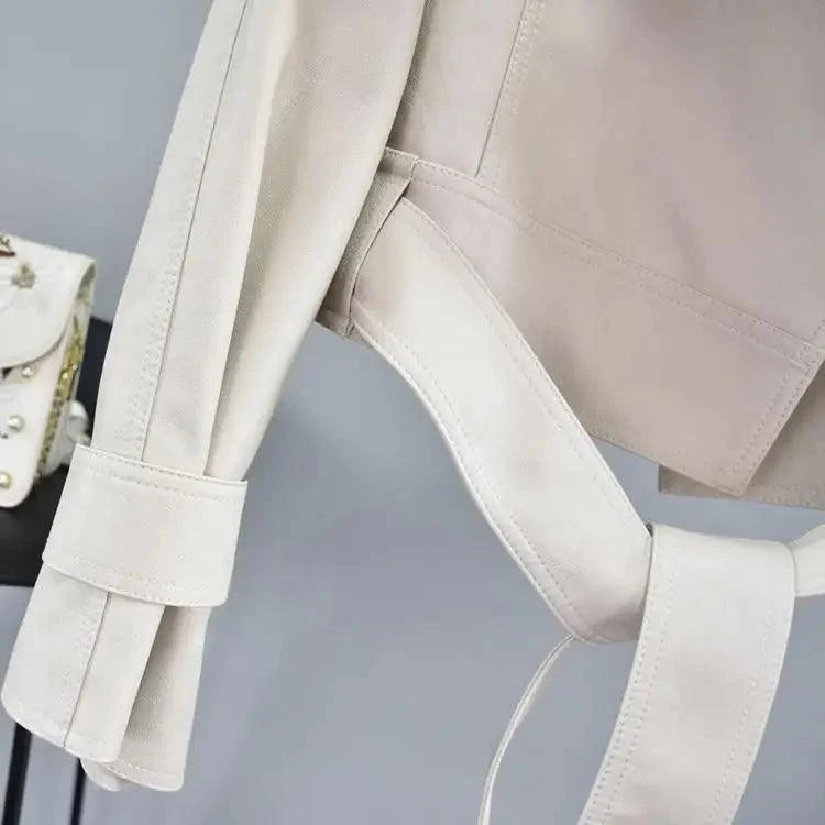 Stevvex cream PU leather motorcycle jacket with waist belt and cuff strap detail, close-up on Tampa Home & Garden Store